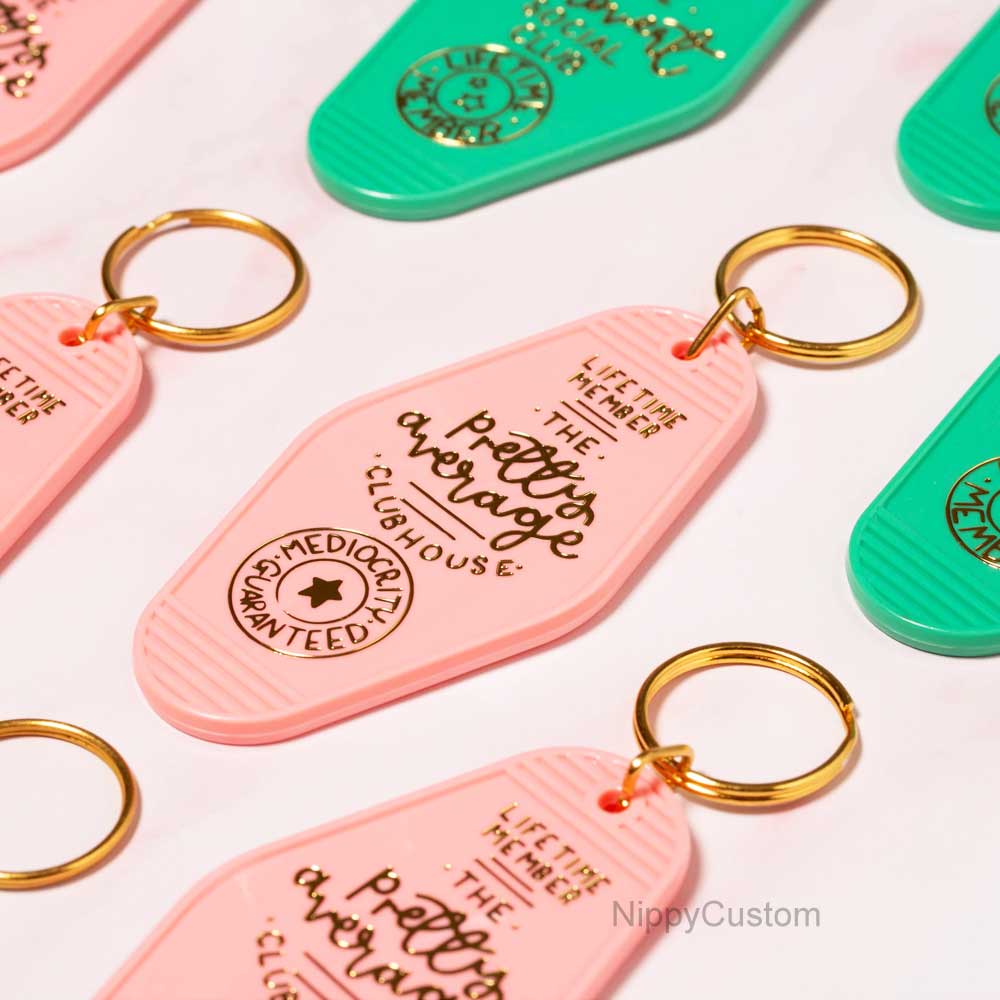 customize UV printed key chains and gold foil stamped logo key tags